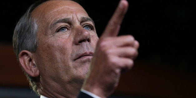 WASHINGTON, DC - DECEMBER 04: U.S. Speaker of the House John Boehner (R-OH) answers questions during his weekly press conference on December 4, 2014 in Washington, DC. Boehner addressed questions relating to the continued funding of the federal government and other issues during his remarks. (Photo by Win McNamee/Getty Images)