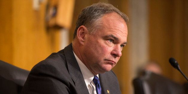FILE - In this July 16, 2013 file photo, Sen. Tim Kaine, D- Va. listens to testimony during a hearing on Capitol Hill in Washington. Kaine and Sen. John McCain, R-Ariz. unveiled legislation on Thursday that would repeal the 1973 War Powers Resolution, often ignored by presidents of both parties, and replace it with a new law that requires greater consultation and a congressional vote within 30 days on any significant armed conflict. (AP Photo/Jacquelyn Martin, File)