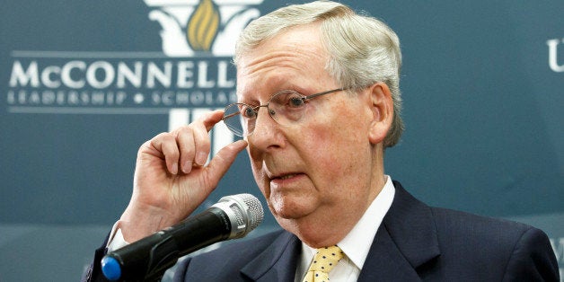 In this photo taken Nov. 5, 2014, Senate Minority Leader Mitch McConnell of Ky. holds a news conference on the day after the GOP gained enough seats to control the Senate in next year's Congress and make McConnell majority leader, in Louisville, Ky. Congress returns to Washington this week for a lame-duck session to try and clean up a lengthy roster of unfinished business, even as jubilant Republicans prepare to take over the Senate for the first time in eight years come January. (AP Photo/J. Scott Applewhite)