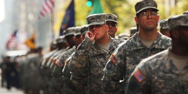 NEW YORK, NY - NOVEMBER 11: Soldiers with the U.S. Army march in the annual Veteran's Day Parade along Fifth Avenue on November 11, 2014 in New York City. Often called the largest Veteran's Day Parade in the country, more than 600,000 people are expected to line the streets for the parade which celebrates the scarifies soldiers have made for the country. (Photo by Spencer Platt/Getty Images)