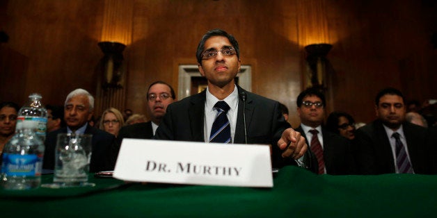 Dr. Vivek Hallegere Murthy, President Barack Obama's nominee to be the next U.S. Surgeon General, prepares to testify on Capitol Hill in Washington, Tuesday, Feb. 4, 2014, before the Senate Health, Education, Labor, and Pensions (HELP) Committee hearing on his nomination. (AP Photo/Charles Dharapak)