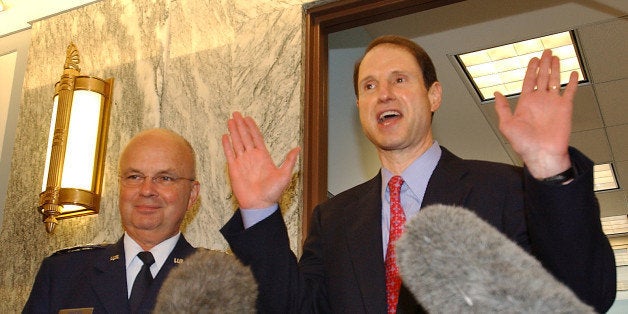 CIA Director nominee Gen. Michael Hayden, left, and Sen. Ron Wyden, D-Ore., meet with reporters on Capitol Hill Friday, May 12, 2006. (AP Photo/Dennis Cook)