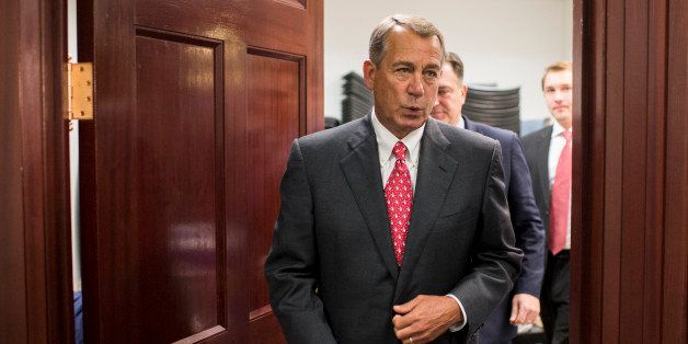 UNITED STATES - DECEMBER 10: Speaker of the House John Boehner, R-Ohio, makes his way to his news conference following the House Republican Conference meeting in the basement of the Capitol on Wednesday, Dec. 10, 2014. (Photo By Bill Clark/CQ Roll Call)