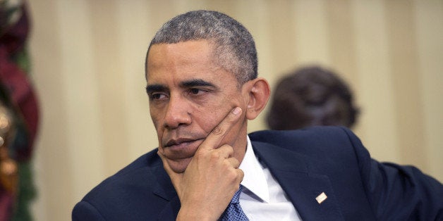 WASHINGTON, DC - DECEMBER 05: U.S. President Barack Obama is seen during a meeting with King Abdullah II of Jordan in the Oval Office at the White House on December 5, 2014 in Washington, D.C. President Obama and King Abdullah II discussed regional issues and the ongoing fight against the Islamic State of Iraq and Syria (ISIS). (Photo by Kevin Dietsch-Pool/Getty Images)