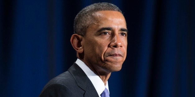 President Barack Obama pauses as he speaks about the Senior Executive Service, composed of the senior leadership of the Feder