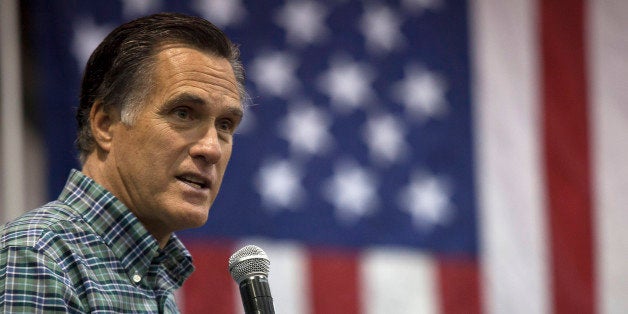 ANCHORAGE, AK - NOVEMBER 03: Former Massachusetts Gov. Mitt Romney addresses the crowd during a rally for Republican Senate candidate Dan Sullivan at a PenAir airplane hangar on November 3, 2014 in Anchorage, Alaska. The U.S. Senate race in Alaska between incumbent Democratic Sen. Mark Begich and Republican candidate Dan Sullivan continues to be closely contested. (Photo by David Ryder/Getty Images)