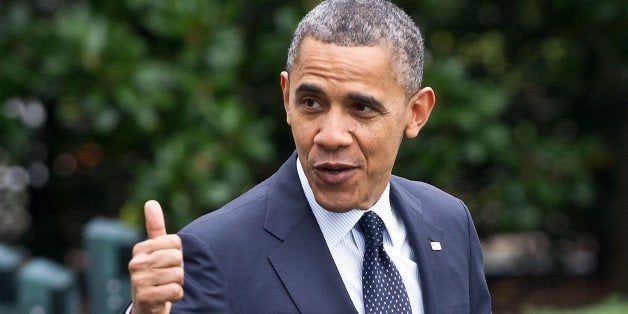 US President Barack Obama gives the thumbs up as he walks out of the White House in Washington on October 7, 2012 before departing for a campaign swing in California. AFP PHOTO/Nicholas KAMM (Photo credit should read NICHOLAS KAMM/AFP/GettyImages)