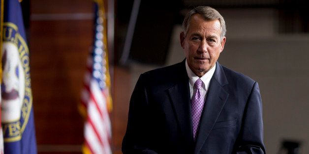 U.S. House Speaker John Boehner, a Republican from Ohio, exits after a news conference in Washington, D.C., U.S., on Thursday, Dec. 4, 2014. House Republican leaders are close to sealing a deal with Democrats over objections from Tea Party lawmakers to fund most of the U.S. government through September 2015 and avoid a repeat of last year's partial shutdown. Photographer: Andrew Harrer/Bloomberg via Getty Images 