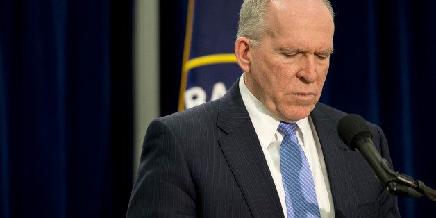 CIA Director John Brennan during a news conference at CIA headquarters in Langley, Va., Thursday, Dec. 11, 2014. Brennan defending his agency from accusations in a Senate report that it used inhumane interrogation techniques against terrorist suspect with no security benefits to the nation. (AP Photo/Pablo Martinez Monsivais)