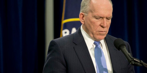 CIA Director John Brennan during a news conference at CIA headquarters in Langley, Va., Thursday, Dec. 11, 2014. Brennan defending his agency from accusations in a Senate report that it used inhumane interrogation techniques against terrorist suspect with no security benefits to the nation. (AP Photo/Pablo Martinez Monsivais)