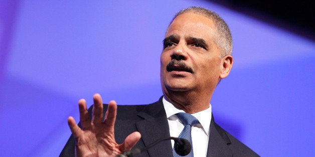 WASHINGTON, DC - OCTOBER 25: U.S. Attorney General Eric Holder speaks at the 18th Annual HRC National Dinner at The Walter E. Washington Convention Center on October 25, 2014 in Washington, DC. (Photo by Paul Morigi/Getty Images)