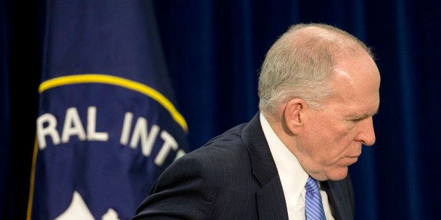 Central Intelligence Director (CIA) Director John Brennan walks away following the conclusion of his news conference at CIA Headquarters in Langley, Va., Thursday, Dec. 11, 2014. Brennan is pushing back hard against the wave of criticism following a Senate Intelligence Committee report detailing harsh interrogation tactics employed by intelligence community people against terrorism war-era detainees. Brennan and several past CIA leaders fear the historical record may define them as torturers instead of patriots. The CIA is now in the uncomfortable position of defending itself publicly, given its basic mission to protect the country secretly. (AP Photo/Pablo Martinez Monsivais)