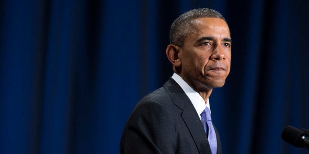 President Barack Obama pauses as he speaks about the Senior Executive Service, composed of the senior leadership of the Federal workforce, Tuesday, Dec. 9, 2014, in Washington. Obama is launching a leadership program for future government career executives with a goal of giving potential managers multi-agency experiences and breaking out of a tradition of promoting senior bureaucrats from within their own agencies. (AP Photo/Evan Vucci)