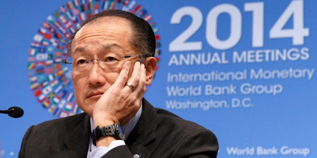 World Bank President Jim Yong Kim holds a news conference at International Monetary Fund headquarters in Washington, Thursday, Oct. 9, 2014. (AP Photo/J. Scott Applewhite)