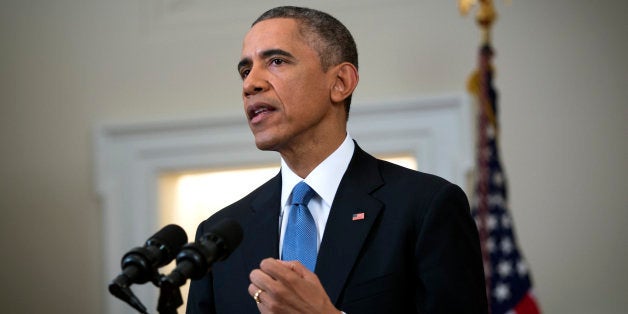 President Barack Obama speaks in the Cabinet Room of the White House in Washington, Wednesday, Dec. 17, 2014, to announce the