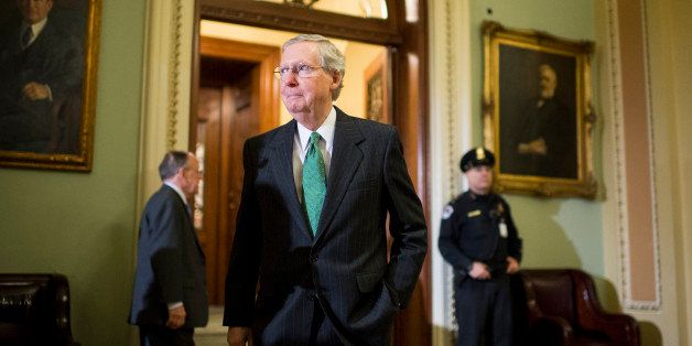 UNITED STATES - DECEMBER 16: Senate Minority Leader Mitch McConnell, R-Ky., arrives to speak to reporters following the Senate Republicans' policy lunch in the Capitol on Tuesday, Dec. 16, 2014. (Photo By Bill Clark/CQ Roll Call)