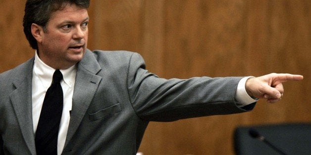 PHILADELPHIA, MS - JUNE 20: State Attorney General Jim Hood gestures at Edgar Ray Killen during the Prosecution's closing arguments in Killen's trial June 20, 2005 in Philadelphia, Mississippi. Killen, a reported member of the Ku Klux Klan, has been charged with 3-count murder of James Chaney, Andrew Goodman, and Michael Schwerner - civil rights workers who were black voters during the 'Freedom Summer' of 1964, case known as 'Mississippi Burning.' The jury was split, 6-6, at the end of the first day of deliberations. (Photo by Rogelio Solis-POOL/Getty Images)