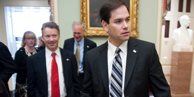 UNITED STATES Ã NOVEMBER 17: From left, Sen.-elect Rand Paul, R-Ky., and Sen.-elect Marco Rubio, R-Fla., leave the Mansfield