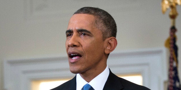 WASHINGTON, DC - DECEMBER 17: U.S. President Barack Obama speaks to the nation about normalizing diplomatic relations the Cuba in the Cabinet Room of the White House on December 17, 2014 in Washington, DC. Obama announced plans to restore diplomatic relations with Cuba, over 50 years after they were severed in January 1961. In a prisoner exchange, U.S. contractor Alan Gross was freed after being held in Cuba since 2009 and sent to Cuba three Cuban spies who had imprisoned in the U.S. since 2001. (Photo by Doug Mills-Pool/Getty Images)