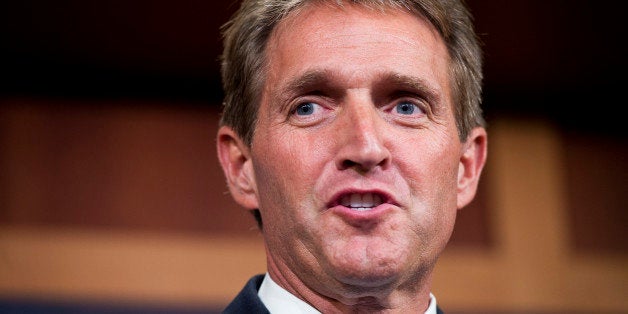 UNITED STATES - JUNE 3: Sen. Jeff Flake, R-Ariz., speaks at a news conference in the Capitol on the Veterans Choice Act, which would provide veterans 'with greater flexibility and choice in health care providers and increasing accountability and transparency at the VA,' June 3, 2014. (Photo By Tom Williams/CQ Roll Call)