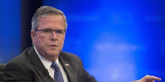 Former Florida Governor Jeb Bush speaks during the Wall Street Journal CEO Council in Washington, DC, December 1, 2014. AFP PHOTO / Jim WATSON (Photo credit should read JIM WATSON/AFP/Getty Images)
