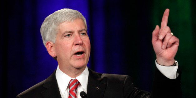 Gov. Rick Snyder speaks at a election night party in Detroit Tuesday, Nov. 4, 2014. Snyder won a second term Tuesday, defeating Democrat Mark Schauer after a race in which the Republican touted an economic and fiscal turnaround and promised to keep Michigan on the right path. (AP Photo/Paul Sancya)