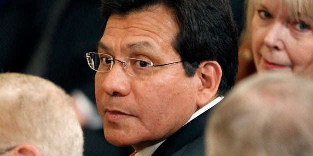 Former Attorney General Alberto R. Gonzales is seen in the East Room of the White House in Washington, Thursday, May 31, 2012, during a ceremony to unveil the official portraits of former President George W. Bush and former first lady Laura Bush. (AP Photo/Pablo Martinez Monsivais)