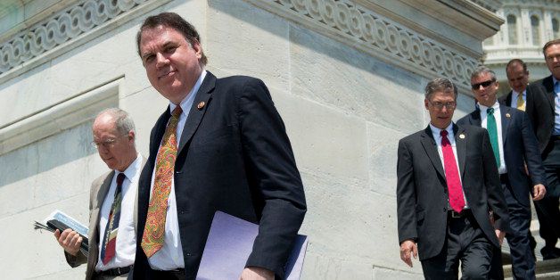 UNITED STATES - MAY 22: Rep. Alan Grayson, D-Fla., walks down the House steps following a vote on Thursday, may 22, 2014. (Photo By Bill Clark/CQ Roll Call)