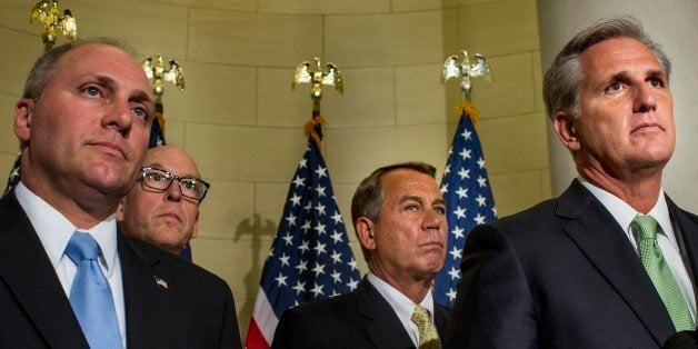 WASHINGTON, DC - JUNE 19: (L-R) Speaking to the media, House Majority Whip Steve Scalise (R-LA), Rep. Greg Walden (R-OR), Speaker of the House John Boehner (R-OH), the newly elected House Majority Leader Kevin McCarthy (R-CA) after the secret ballot voting in the House leader and House Whip races at the Longworth House Office Building on Capitol Hill in Washington, DC Thursday June 19, 2014. (Photo by Melina Mara/The Washington Post via Getty Images)