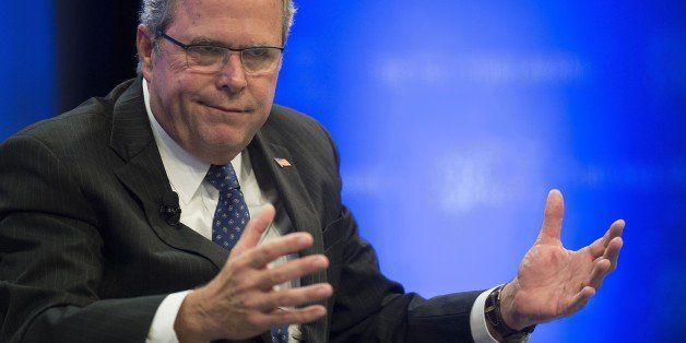 Former Florida Governor Jeb Bush speaks during the Wall Street Journal CEO Council in Washington, DC, December 1, 2014. AFP PHOTO / Jim WATSON (Photo credit should read JIM WATSON/AFP/Getty Images)