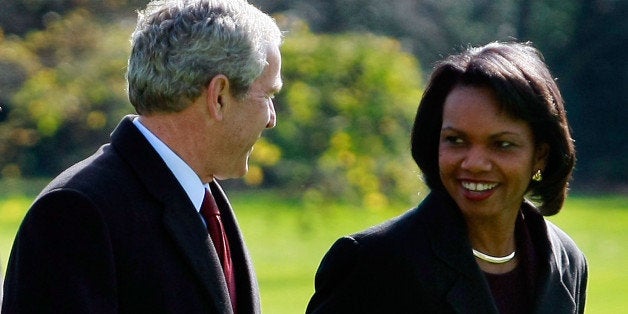 WASHINGTON - NOVEMBER 17: (AFP OUT) U.S. President George W. Bush (L) walks with Secretary of State Condoleezza Rice after arriving at the White House November 17, 2008 in Washington, DC. President Bush was returning from Camp David, the presidential retreat in Maryland. (Photo by Mark Wilson/Getty Images)