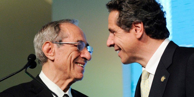 Former Governor of New York Mario Cuomo, left, introduces his son and current Governor of New York and "Game Changer" honoree Andrew Cuomo at the AOL Huffington Post Game Changers Awards at Skylight Soho on Tuesday, Oct. 18, 2011 in New York. (AP Photo/Evan Agostini)