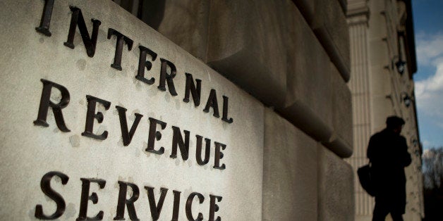 The Internal Revenue Service (IRS) headquarters strands in Washington, D.C., U.S., on Wednesday, April 9, 2014. The deadline for filing 2013 U.S. taxes is April 15. Photographer: Andrew Harrer/Bloomberg via Getty Images