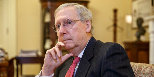 Incoming Senate Majority Leader Mitch McConnell, R-Ky., talks about his agenda for a GOP-controlled Congress during an interview with The Associated Press at the Capitol in Washington, Wednesday, Dec. 17, 2014. McConnell pledged to do all he can to stop President Barack Obama's coal plant regulations, saying a White House "crusade" was devastating his state's economy. (AP Photo/J. Scott Applewhite)