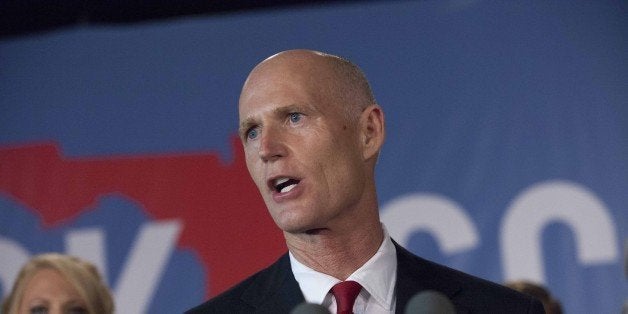 BONITA SPRINGS, FL - NOVEMBER 4: Florida Rep. Gov. Rick Scott gives his victory speech November 4, 2014 in Bonita Springs, Florida. Scott won a tight race against former Florida Governor and Democratic gubernatorial candidate Charlie Crist. (Photo by Erik Kellar/Getty Images)