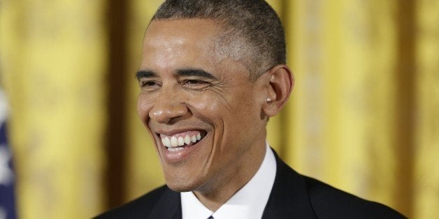 President Barack Obama smiles as he answer questions during his news conference in the East Room of the White House, on Wednesday, Nov. 5, 2014, in Washington. (AP Photo/Pablo Martinez Monsivais)
