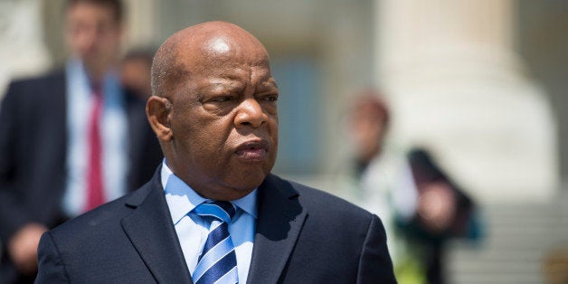 UNITED STATES - JULY 11: Rep. John Lewis, D-Ga., leaves the Capitol following a vote on Friday, July 11, 2014. (Photo By Bill Clark/CQ Roll Call)