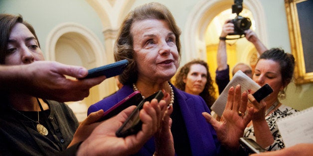 UNITED STATES - DECEMBER 09: Sen. Dianne Feinstein, D-Calif., Chairwoman of the Senate Intelligence Committee, talks with reporters after sharing a report on the CIA and it's torture methods, December 9, 2014. (Photo By Tom Williams/CQ Roll Call)