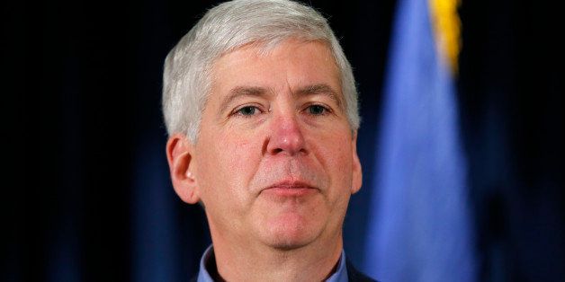 Gov. Rick Snyder speaks at a news conference in Detroit Wednesday, Dec. 10, 2014. Snyder said that the nation's largest municipal bankruptcy will end at midnight. (AP Photo/Paul Sancya)