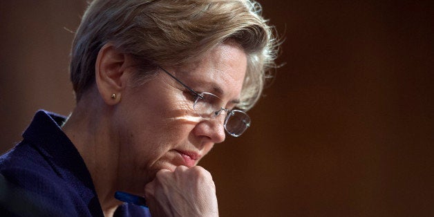 Sen. Elizabeth Warren, D-Mass., pauses while questioning a witness at Senate Banking Committee hearing on anti-money laundering on Capitol Hill in Washington, Thursday, March 7, 2013. Warren rose to national prominence as an outspoken consumer advocate decrying Wall Street abuses and became the progressive movementâs darling candidate in last fallâs Senate elections. Like most freshman lawmakers, the Massachusetts Democrat has maintained a low profile during her first few months in office, but thatâs starting to change. (AP Photo/Cliff Owen)