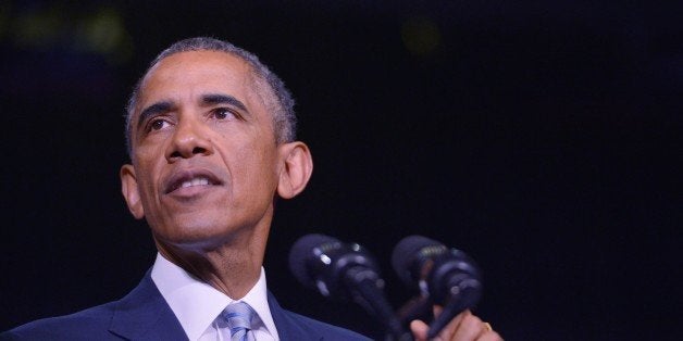 US President Barack Obama speaks on new proposals for higher education accessibility at Pellissippi State Community College in Knoxville, Tennessee on January 9, 2015. AFP PHOTO/MANDEL NGAN (Photo credit should read MANDEL NGAN/AFP/Getty Images)