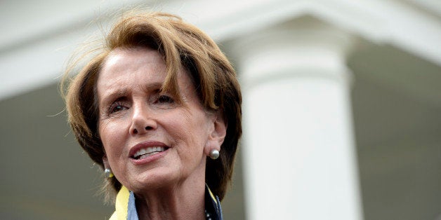 House Minority Leader Nancy Pelosi of Calif. speaks to reporters outside the West Wing of the White House in Washington, Tuesday, April 1, 2014, following her lunch with President Barack Obama. Pelosi was asked several questions about the Affordable Care Act. (AP Photo/Susan Walsh)