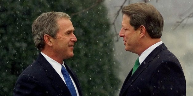 Vice President Gore greets President-elect Bush, as the snow falls outside the vice president's residence, prior to their meeting in Washington, Tuesday, Dec. 19, 2000. Bush met President Clinton earlier in the day. (AP Photo/Doug Mills)