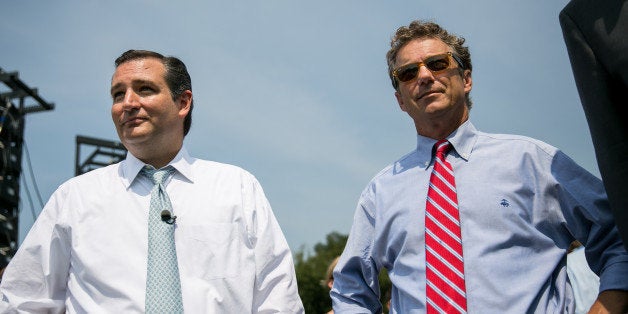 WASHINGTON, DC - SEPTEMBER 10: U.S. Sen. Ted Cruz (R-TX) (L) and Sen. Rand Paul (R-KY) wait to speak at the 'Exempt America