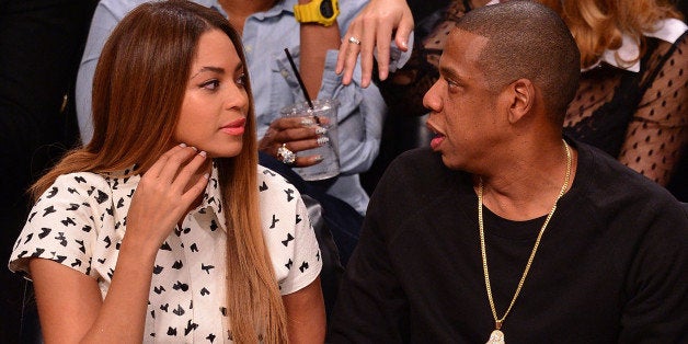 NEW YORK, NY - DECEMBER 08: Beyonce and Jay-Z attend the Brooklyn Nets vs Cleveland Cavaliers game at Barclays Center on December 8, 2014 in New York City. (Photo by James Devaney/GC Images)