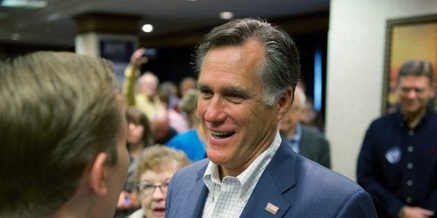 CEDAR RAPIDS, IOWA - OCTOBER 13: Former Massachusetts Gov. and GOP presidential candidate Mitt Romney makes his way through supporters of Iowa Republican State Senator and U.S. Senate candidate Joni Ernst on October 11, 2014 in Cedar Rapids, Iowa. Ernst and Romney met with around 300 supporters at the event, one of many in the final weeks of Ernst's campaign for a U.S. Senate seat. U.S. Representative Bruce Braley (D-IA) and Ernst are virtually tied in polling to replace the seat occupied by retiring U.S. Senator Tom Harkin (D-IA). (Photo by David Greedy/Getty Images)