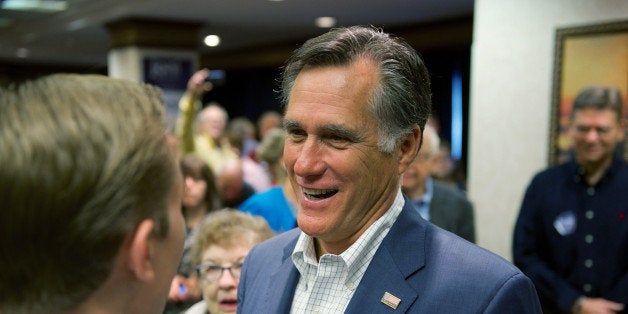 CEDAR RAPIDS, IOWA - OCTOBER 13: Former Massachusetts Gov. and GOP presidential candidate Mitt Romney makes his way through supporters of Iowa Republican State Senator and U.S. Senate candidate Joni Ernst on October 11, 2014 in Cedar Rapids, Iowa. Ernst and Romney met with around 300 supporters at the event, one of many in the final weeks of Ernst's campaign for a U.S. Senate seat. U.S. Representative Bruce Braley (D-IA) and Ernst are virtually tied in polling to replace the seat occupied by retiring U.S. Senator Tom Harkin (D-IA). (Photo by David Greedy/Getty Images)