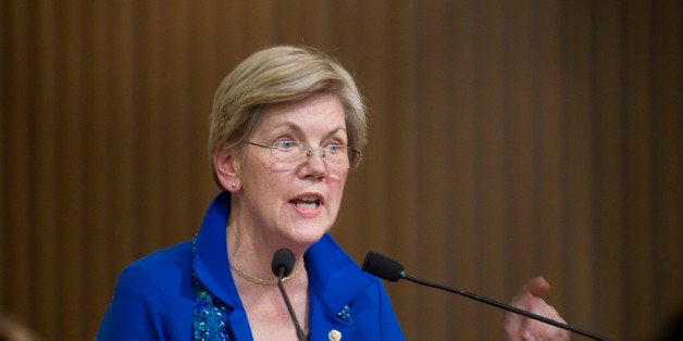 BOSTON - JANUARY 11: U.S. Senator from Massachusetts Elizabeth Warren received the MLK Leadership Award during the Martin Luther King, Jr. Convocation service at Twelfth Baptist Church in the Roxbury neighborhood on January 11, 2015. (Photo by Dina Rudick/The Boston Globe via Getty Images)