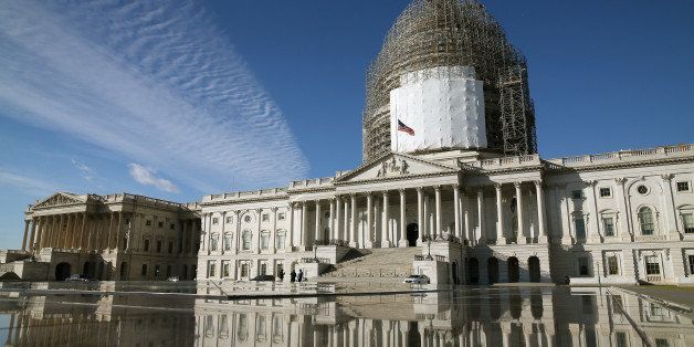 WASHINGTON, DC - JANUARY 05: The US Capitol is reflected in a fountain, January 5, 2015 in Washington, DC. Tomorrow Congress will convene its first session of the 114th Congress with Republicans controlling both the House and Senate. (Photo by Mark Wilson/Getty Images)