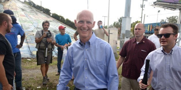 MIAMI, FL - JANUARY 11: Governer Rick Scott participates in Three Kings Parade in Miami's Little Havana on January 11, 2015 i